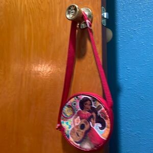 Disney girls purse red colored w/disney girl character playing a quitar w/flower